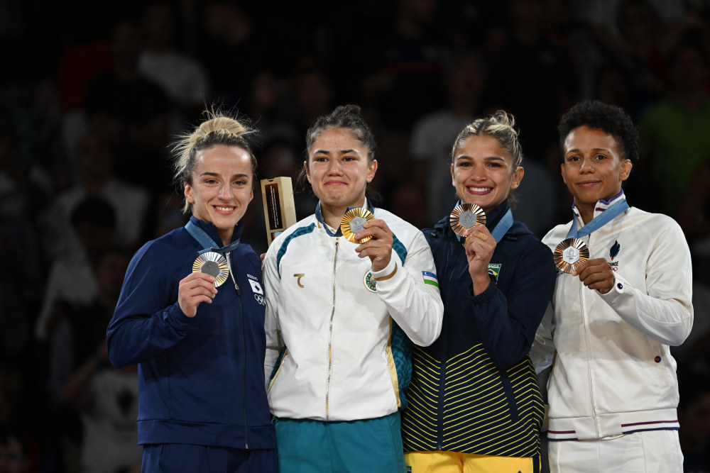 德国选手登顶柔道领奖台,喜极而泣 德国选手登顶柔道领奖台,喜极而泣